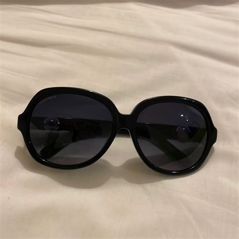 Chanel sunglasses on side